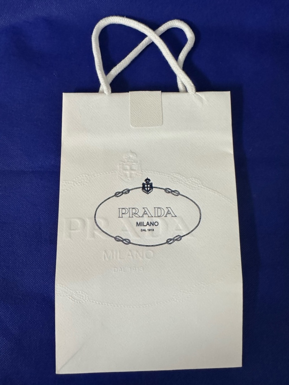 Prada 💯% Authentic iconic luxury paper shopping bag. Like New Ideal for gifting